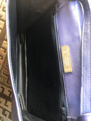 Vintage Valentino Garavani blue leather clutch shoulder bag with brown and golden logo plate at front. Gathered design.