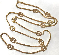 Vintage Lanvin golden chain long necklace with logo motif charms. Rare Lanvin vintage jewelry. Long necklace. 0403311