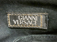 Vintage Gianni Versace black leather purse pouch, case bag with its iconic medusa face and golden logo motif charm. Unisex bag. 061122re1