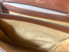 Vintage Gucci brown leather micro GG print shoulder bag with iconic golden large round GG motif. Rare masterpiece purse.