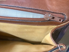 Vintage Gucci brown leather micro GG print shoulder bag with iconic golden large round GG motif. Rare masterpiece purse.