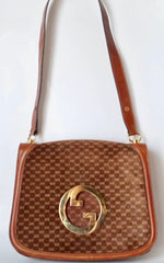 Vintage Gucci brown leather micro GG print shoulder bag with iconic golden large round GG motif. Rare masterpiece purse.