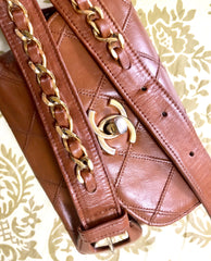 L20190528. 1990s. Vintage CHANEL brown calf leather belt bag, fanny pack, hip bag with gold CC closure and chain belt. Belt fits 29.3" through 32.5".