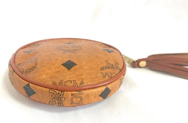 Vintage MCM brown monogram round shape coin case with tassel. Mini pur –  eNdApPi ***where you can find your favorite designer  vintages..authentic, affordable, and lovable.
