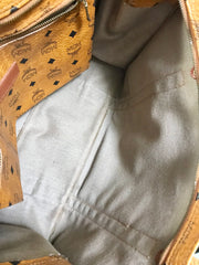 Vintage MCM brown monogram large tote bag with long straps. Classic style for unisex use. By Michael Cromer.