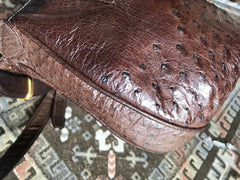 Vintage GUCCI dark brown genuine ostrich leather fisherman bag style shoulder bag with logo embossed motif. Rare masterpiece.