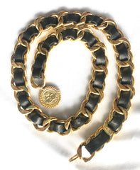Vintage CHANEL black leather thick chain belt with golden mademoiselle and CC charm. Nice and heavy single layer belt.