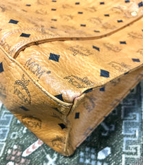 Vintage MCM brown monogram large tote bag with long straps. Classic style for unisex use. By Michael Cromer.