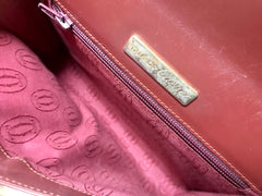 Vintage Cartier wine leather clutch bag, mini document purse with logo motif. Unisex bag from must de Cartier Collection. 060531r8