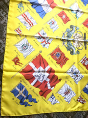 Vintage HERMES Carre large yellow silk scarf with red, blue, and white flag print. Best foulard. PAVOIS.
