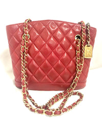 Vintage CHANEL lipstick red quilted lambskin leather trapezoid shape tote bag with a gold CC plate and chains.