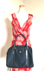 Vintage Christian Dior navy handbag with logo jacquard nylon and leather trimmings. Classic purse. 0506288e