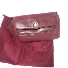Vintage Cartier wine leather clutch bag with gold tone logo motif. Classic purse from must de Cartier Collection. 060926re8