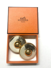 Vintage HERMES golden round earrings with white silk fabric frames. Classic jewel piece.
