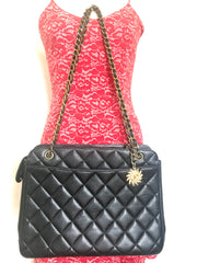 Vintage CHANEL black caviar matelasse chain shoulder bag with golden sun flower CC mark charm. Classic daily use bag.050315r5