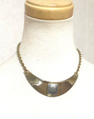 Vintage Celine gold tone crescent moon shape necklace with silver triomphe logo. 05062810