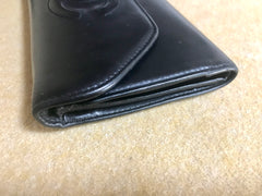 Vintage CHANEL black leather wallet with large CC stitch mark. Rare wallet from Chanel in 90’s. 050320r9
