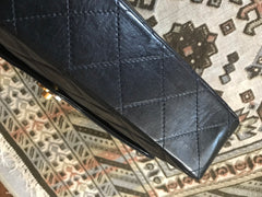 OFV 20210526 Vintage Chanel black lamb 2.55 double flap chain shoulder bag with gold and silver CC motif. Paris limited edition. Mid to large size