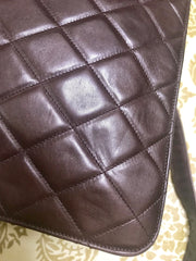 80's vintage Chanel dark brown quilted lambskin shoulder bag with CC motif and built-in chain shoulder strap. Rare Chanel purse