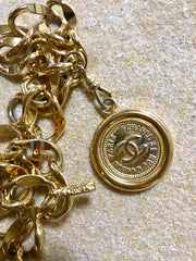 Vintage CHANEL golden thick lightweight chain belt with round CC coin charm and double layer design at front. 78cm