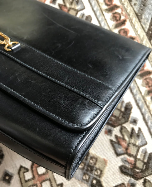Vintage Celine black calfskin leather clutch purse with iconic