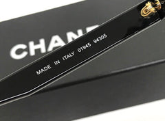 Vintage CHANEL black round frame mod sunglasses with white CHANEL PARIS logo. 060412