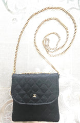 Vintage Chanel black quilted satin fabric mini pouch, coin purse, long necklace with golden chain and CC motif. Fiocci snap. 060516re2