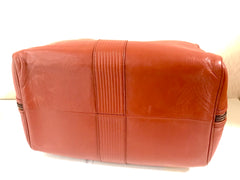 Vintage Yves Saint Laurent brown leather handbag with YSL marks. Classic unisex use bag, speedy bag.