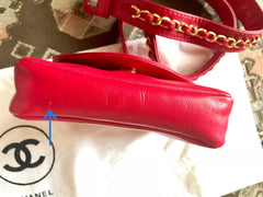 Vintage CHANEL red leather belt bag, fanny pack with detachable chain belt and CC stitch mark on flap. Fits 29.5" through 32.8"