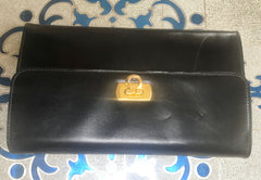 Vintage Salvatore Ferragamo Gancini black leather wallet with gold tone closure. Classic purse.