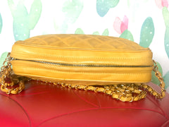 Ves Vintage Chanel yellow lambskin camera bag style chain shoulder bag with fringe and CC stitch mark. Good daily purse. Good fortune color.