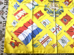 Vintage HERMES Carre large yellow silk scarf with red, blue, and white flag print. Best foulard. PAVOIS.