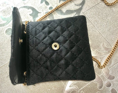 Vintage Chanel black quilted satin fabric mini pouch, coin purse, long necklace with golden chain and CC motif. Fiocci snap. 060516re2