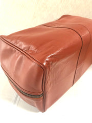 Vintage Yves Saint Laurent brown leather handbag with YSL marks. Classic unisex use bag, speedy bag.