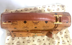 Vintage MCM classic brown monogram Kelly bag with golden logo plate. Perfect daily use bag.  By Michael Cromber, Germany