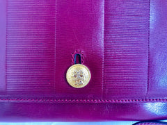 Vintage FENDI wine leather shoulder bag, large clutch purse with iconic Janus medallion embossed motifs at front. Unisex. 060620re5