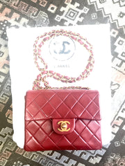 Vintage CHANEL deep red lambskin mini 2.55 bag with golden CC and chain strap. Classic Chanel red bag back in the era.