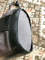 Vintage Yves Saint Laurent black and purple hobo bucket shoulder bag with leather trimmings and golden logo plate. YSL classic purse.