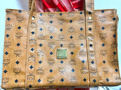 Vintage MCM brown monogram large tote bag with long straps. Classic style for unisex use. By Michael Cromer.