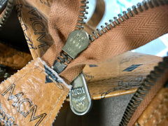 Vintage MCM brown monogram large tote bag with long straps. Classic style for unisex use. By Michael Cromer.
