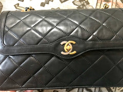 OFV 20210526 Vintage Chanel black lamb 2.55 double flap chain shoulder bag with gold and silver CC motif. Paris limited edition. Mid to large size