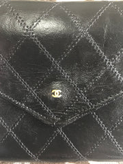1980s. Vintage CHANEL black goatskin bill, card, checkbook long wallet pouch purse with mini CC motif. Classic unisex style.