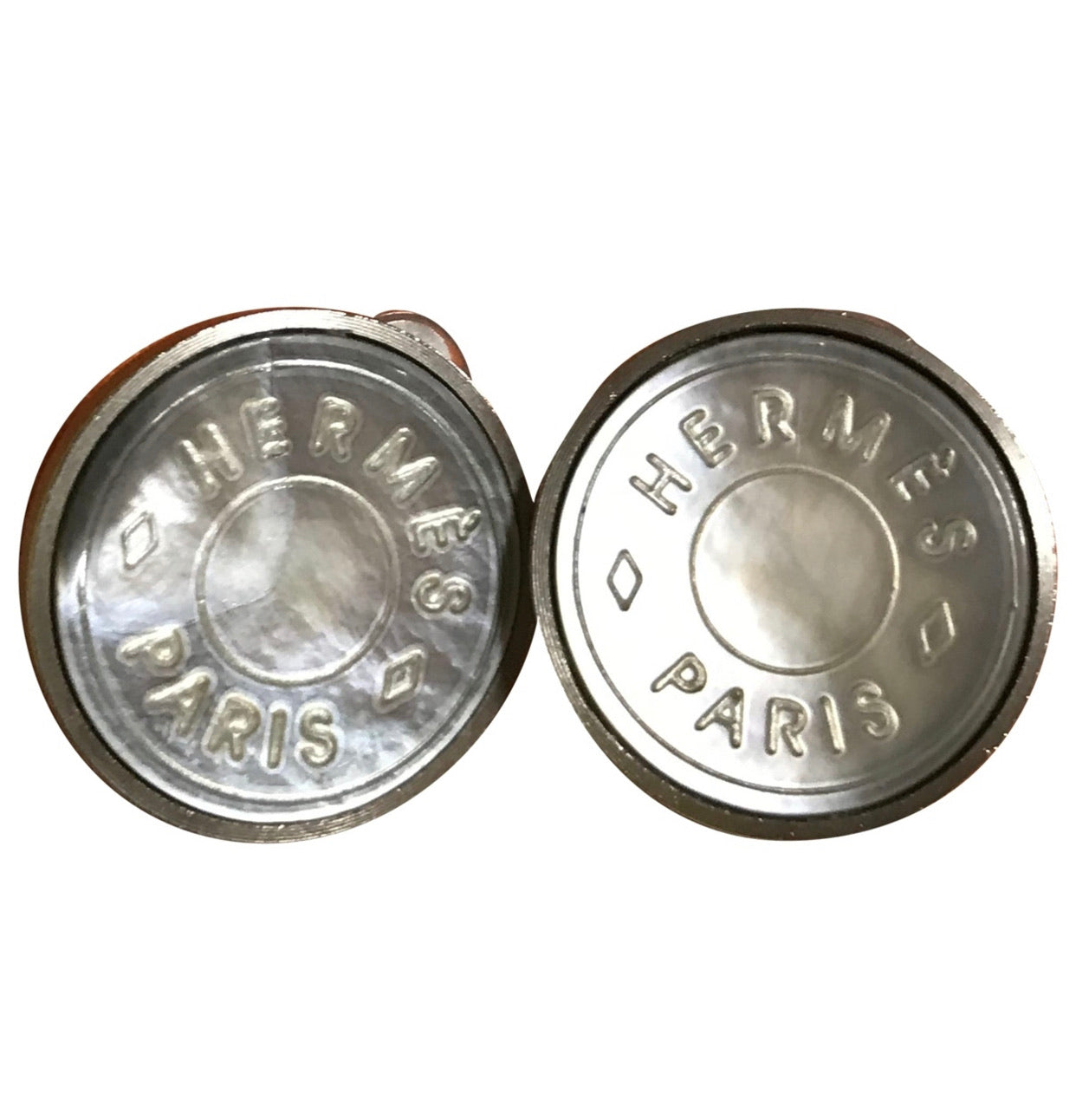 Vintage HERMES silver tone logo embossed genuine shell earrings. Classic jewel piece. Bijouterie Fantaisie