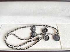 MINT. Vintage CHANEL skinny silver chain necklace with symbolic coin charms and black leather. Can be bracelet too. 060531r1