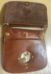Vintage Gucci brown leather micro GG print shoulder bag with iconic golden large round GG motif. Rare masterpiece purse.