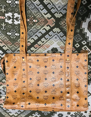 Vintage MCM brown monogram large tote bag with long straps. Classic style for unisex use. By Michael Cromer.