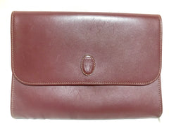 Vintage Cartier wine leather clutch bag, mini document purse with logo motif. Unisex bag from must de Cartier Collection. 060531r8