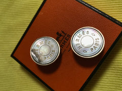 Vintage HERMES silver tone logo embossed genuine shell earrings. Classic jewel piece. Bijouterie Fantaisie