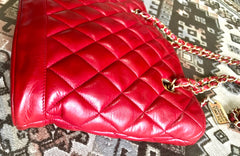 Vintage CHANEL lipstick red quilted lambskin leather trapezoid shape tote bag with a gold CC plate and chains.