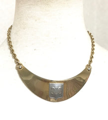 Vintage Celine gold tone crescent moon shape necklace with silver triomphe logo. 05062810